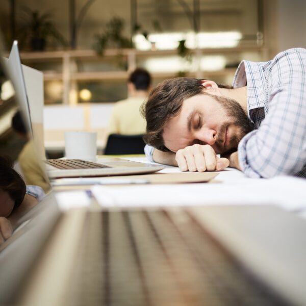 Man tired sleeping on the computer